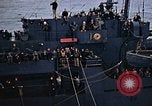 Image of Mail and personnel transfer between escort carrier and destroyer escor Pacific Ocean, 1945, second 50 stock footage video 65675040330