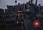 Image of Mail and personnel transfer between escort carrier and destroyer escor Pacific Ocean, 1945, second 51 stock footage video 65675040330