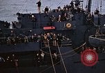 Image of Mail and personnel transfer between escort carrier and destroyer escor Pacific Ocean, 1945, second 52 stock footage video 65675040330