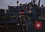 Image of Mail and personnel transfer between escort carrier and destroyer escor Pacific Ocean, 1945, second 54 stock footage video 65675040330