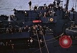 Image of Mail and personnel transfer between escort carrier and destroyer escor Pacific Ocean, 1945, second 55 stock footage video 65675040330