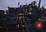 Image of Mail and personnel transfer between escort carrier and destroyer escor Pacific Ocean, 1945, second 58 stock footage video 65675040330
