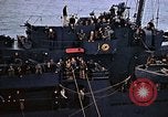 Image of Mail and personnel transfer between escort carrier and destroyer escor Pacific Ocean, 1945, second 59 stock footage video 65675040330