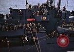 Image of Mail and personnel transfer between escort carrier and destroyer escor Pacific Ocean, 1945, second 60 stock footage video 65675040330