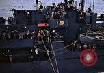Image of Mail and personnel transfer between escort carrier and destroyer escor Pacific Ocean, 1945, second 61 stock footage video 65675040330