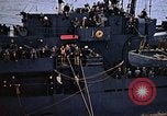 Image of Mail and personnel transfer between escort carrier and destroyer escor Pacific Ocean, 1945, second 62 stock footage video 65675040330