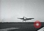 Image of US Navy TBM aircraft landing on carrier Pensacola Florida USA, 1945, second 3 stock footage video 65675040337