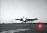 Image of US Navy TBM aircraft landing on carrier Pensacola Florida USA, 1945, second 4 stock footage video 65675040337