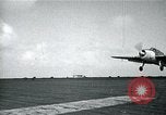 Image of US Navy TBM aircraft landing on carrier Pensacola Florida USA, 1945, second 9 stock footage video 65675040337