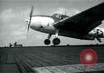 Image of US Navy TBM aircraft landing on carrier Pensacola Florida USA, 1945, second 11 stock footage video 65675040337