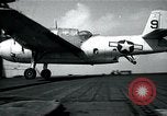 Image of US Navy TBM aircraft landing on carrier Pensacola Florida USA, 1945, second 12 stock footage video 65675040337