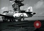 Image of US Navy TBM aircraft landing on carrier Pensacola Florida USA, 1945, second 14 stock footage video 65675040337