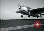 Image of US Navy TBM aircraft landing on carrier Pensacola Florida USA, 1945, second 15 stock footage video 65675040337