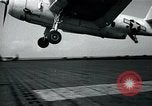 Image of US Navy TBM aircraft landing on carrier Pensacola Florida USA, 1945, second 16 stock footage video 65675040337