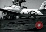 Image of US Navy TBM aircraft landing on carrier Pensacola Florida USA, 1945, second 18 stock footage video 65675040337