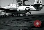 Image of US Navy TBM aircraft landing on carrier Pensacola Florida USA, 1945, second 19 stock footage video 65675040337