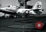 Image of US Navy TBM aircraft landing on carrier Pensacola Florida USA, 1945, second 20 stock footage video 65675040337