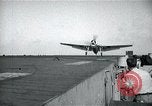 Image of US Navy TBM aircraft landing on carrier Pensacola Florida USA, 1945, second 21 stock footage video 65675040337
