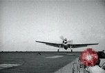 Image of US Navy TBM aircraft landing on carrier Pensacola Florida USA, 1945, second 22 stock footage video 65675040337