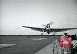 Image of US Navy TBM aircraft landing on carrier Pensacola Florida USA, 1945, second 23 stock footage video 65675040337