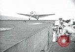 Image of US Navy TBM aircraft landing on carrier Pensacola Florida USA, 1945, second 27 stock footage video 65675040337