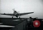 Image of US Navy TBM aircraft landing on carrier Pensacola Florida USA, 1945, second 30 stock footage video 65675040337