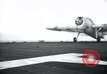 Image of US Navy TBM aircraft landing on carrier Pensacola Florida USA, 1945, second 31 stock footage video 65675040337