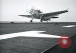 Image of US Navy TBM aircraft landing on carrier Pensacola Florida USA, 1945, second 36 stock footage video 65675040337