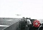 Image of FM-2 aircraft breaks tailwheel in landing Atlantic Ocean, 1945, second 1 stock footage video 65675040338