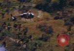 Standbild AH-1G und OH-6A Hubschrauber Vietnam, 1968, aus Sekunde 4 historischem Filmmaterial Videoclip 65675040351
