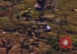 Standbild AH-1G und OH-6A Hubschrauber Vietnam, 1968, aus Sekunde 9 historischem Filmmaterial Videoclip 65675040351