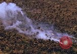 Standbild AH-1G und OH-6A Hubschrauber Vietnam, 1968, aus Sekunde 42 historischem Filmmaterial Videoclip 65675040351