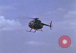Standbild AH-1G mit Raketen Vietnam, 1968, aus Sekunde 36 historischem Filmmaterial Videoclip 65675040353