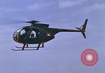 Standbild AH-1G mit Raketen Vietnam, 1968, aus Sekunde 39 historischem Filmmaterial Videoclip 65675040353