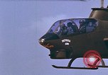 Standbild AH-1G mit Raketen Vietnam, 1968, aus Sekunde 46 historischem Filmmaterial Videoclip 65675040353