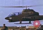 Standbild AH-1G mit Raketen Vietnam, 1968, aus Sekunde 52 historischem Filmmaterial Videoclip 65675040353