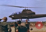 Standbild AH-1G mit Raketen Vietnam, 1968, aus Sekunde 53 historischem Filmmaterial Videoclip 65675040353
