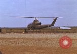 Standbild AH-1G mit Raketen Vietnam, 1968, aus Sekunde 62 historischem Filmmaterial Videoclip 65675040353