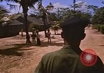 Immagine di Navy corpsman conduce clinica nel villaggio Vietnamita Vietnam del Sud, 1967, secondo 40 filmato di repertorio 65675040358