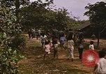 Immagine di Navy corpsman conduce clinica nel villaggio Vietnamita Vietnam del Sud, 1967, secondo 57 filmato di repertorio 65675040358
