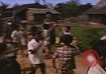 Immagine di Navy corpsman conduce clinica nel villaggio Vietnamita Vietnam del Sud, 1967, secondo 60 filmato di repertorio 65675040358