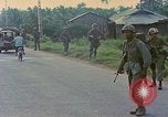 Image of US Army soldiers in field Vietnam, 1968, second 6 stock footage video 65675040364
