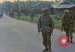 Image of US Army soldiers in field Vietnam, 1968, second 9 stock footage video 65675040364