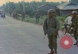 Image of US Army soldiers in field Vietnam, 1968, second 10 stock footage video 65675040364