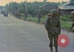 Image of US Army soldiers in field Vietnam, 1968, second 11 stock footage video 65675040364