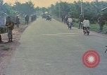 Image of US Army soldiers in field Vietnam, 1968, second 14 stock footage video 65675040364
