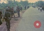 Image of US Army soldiers in field Vietnam, 1968, second 16 stock footage video 65675040364