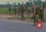 Image of US Army soldiers in field Vietnam, 1968, second 22 stock footage video 65675040364