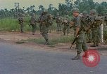 Image of US Army soldiers in field Vietnam, 1968, second 23 stock footage video 65675040364