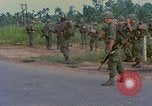 Image of US Army soldiers in field Vietnam, 1968, second 24 stock footage video 65675040364
